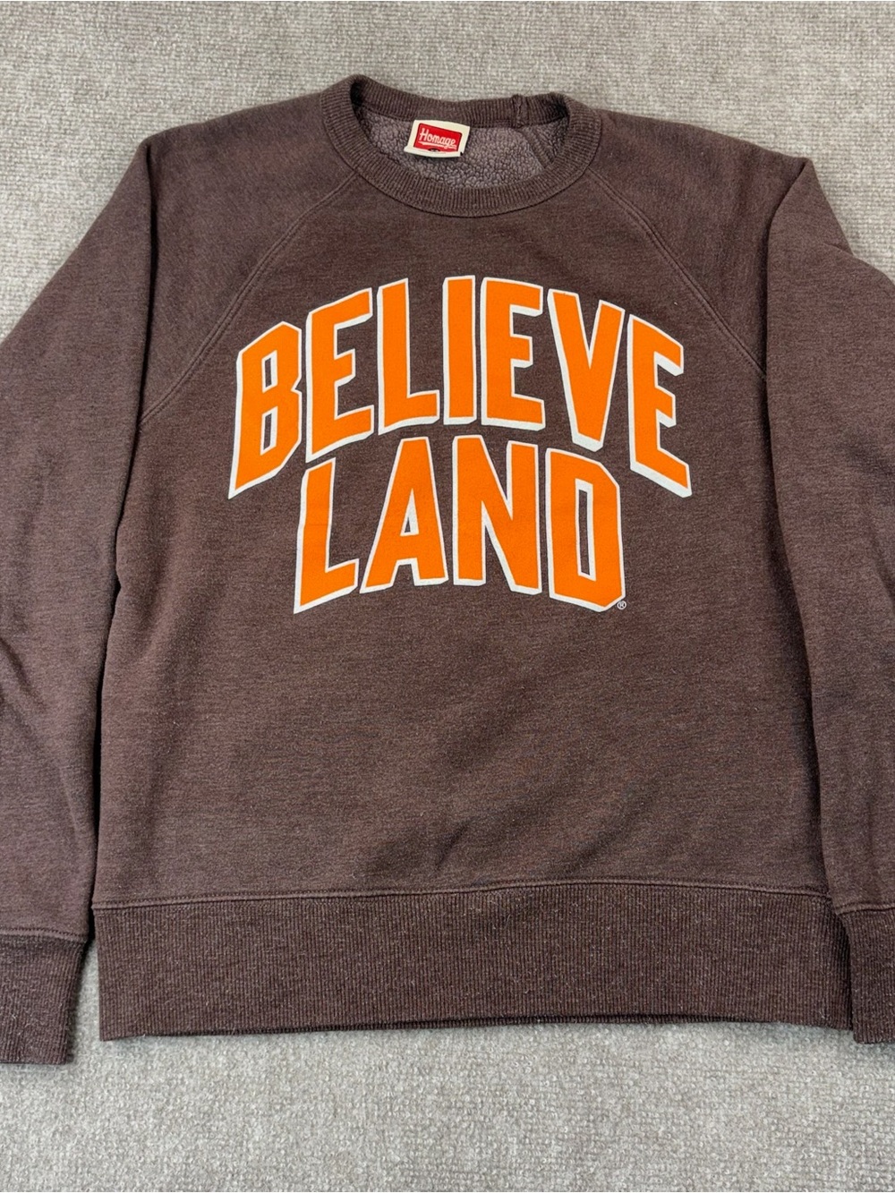 NFL BROWNS Believe Land Graphic Sweatshirt - Brown with Orange Text